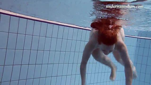 Fat teen underwater shows her bouncing body